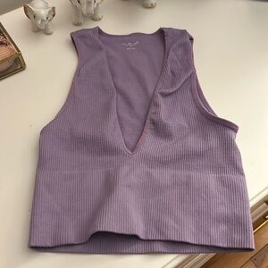 Bright purple, tight crop top.